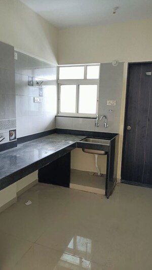 Kitchen in 2 BHK Apartment at Vedant Kingston Aura, Handewadi – for Rent