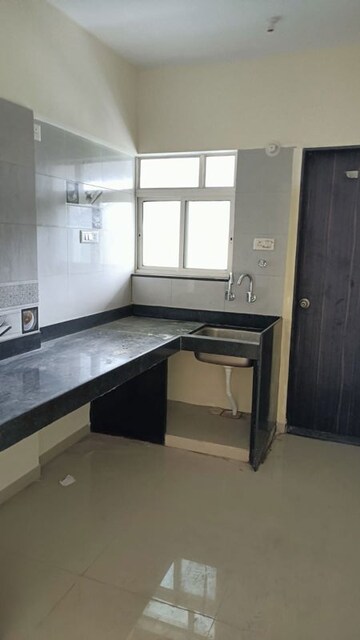 Kitchen in 2 BHK Apartment at Vedant Kingston Aura, Handewadi – for Rent