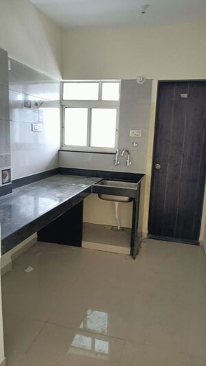 Kitchen in 2 BHK Apartment at Vedant Kingston Aura, Handewadi – for Rent