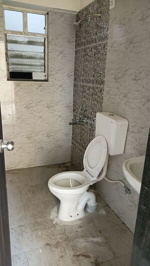 Bathroom in 2 BHK Apartment at Vedant Kingston Aura, Handewadi – for Rent