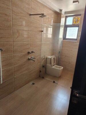 Bathroom in 4 BHK Apartment at Sector 1 Dwarka – for Rent