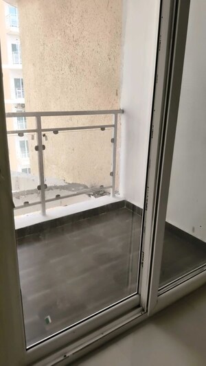 Balcony in 2 BHK Apartment at Samridhi Luxuriya Avenue, Sector 150 – for Rent