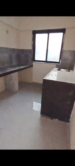 Kitchen in 3 BHK Apartment at Universal Garden Ii, Jogeshwari West – for Sale