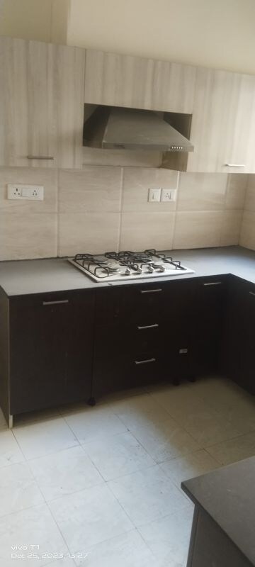 Kitchen in 3 BHK Builder Floor at Ansal API Esencia, Sector 67 – for Sale