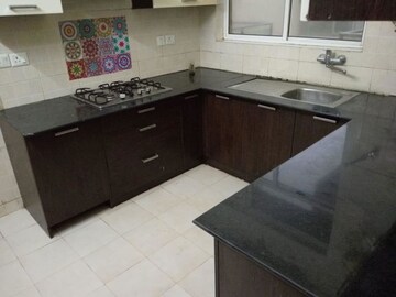 Kitchen in 3 BHK Builder Floor at Ansal API Esencia, Sector 67 – for Sale