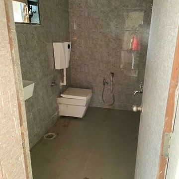 Bathroom in 3 BHK Apartment at Shree Balaji Satyam Towers, Kopar Khairane – for Sale
