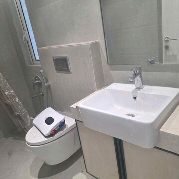 Bathroom in 3 BHK Apartment at Indiabulls Sky Forest, Dighe Nagar – for Rent