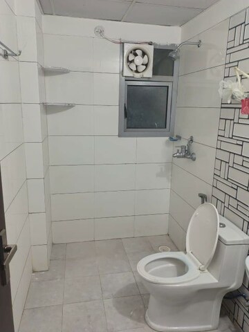 Bathroom in 3 BHK Apartment at Gulshan Bellina, Sector 16 Greater Noida – for Rent