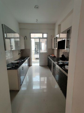 Kitchen in 4 BHK Apartment at Nirala Aspire, Sector 16 Greater Noida – for Rent