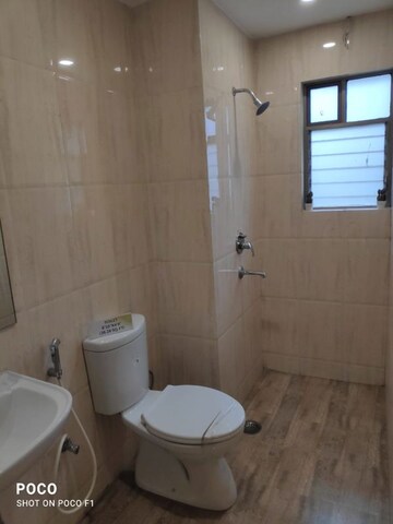 Bathroom in 3 BHK Apartment at Sureka Sunrise Aura, Dakshin Gobindopur – for Sale
