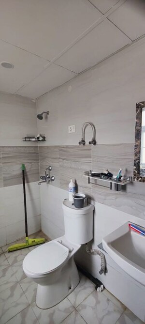 Bathroom in 2 BHK Apartment at Kingson Green Villa Phase 2, Panchsheel Green – for Sale