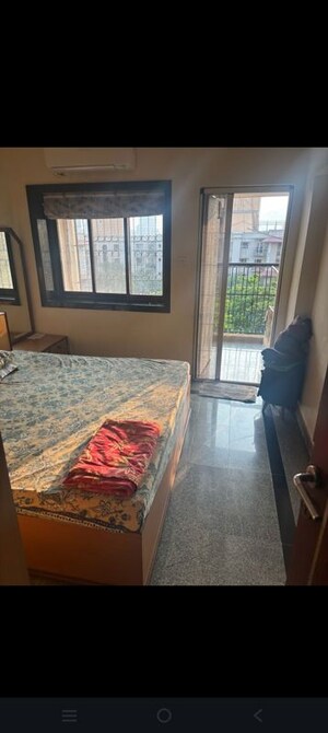 Bedroom in 2 BHK Apartment at Crystal Garden Estate CHS, Manpada – for Rent