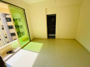 Master Bedroom in 1 BHK Apartment at Motiram Royal Park, Ambernath East – for Sale