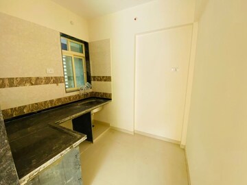 Kitchen in 1 BHK Apartment at Motiram Royal Park, Ambernath East – for Sale