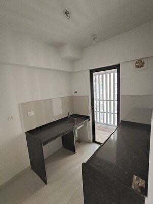 Kitchen in 1.5 BHK Apartment at Lodha Downtown, Dombivli East – for Rent