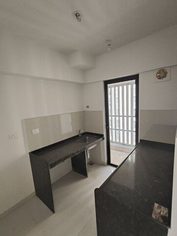 Kitchen in 1.5 BHK Apartment at Lodha Downtown, Dombivli East – for Rent