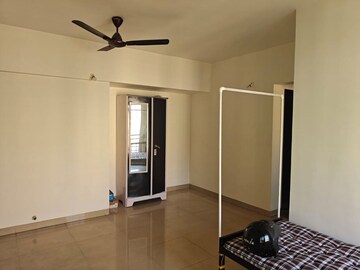 Living Room in 2 BHK Apartment at Akanksha Rainart, Vartak Nagar – for Rent