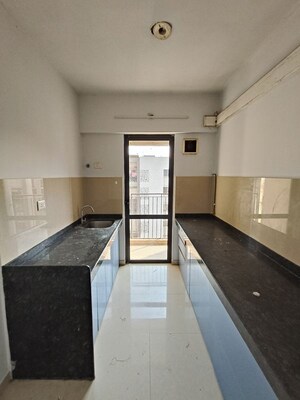 Kitchen in 1.5 BHK Apartment at Lodha Lakeshore Greens, Dombivli East – for Rent