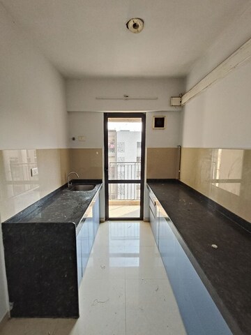 Kitchen in 1.5 BHK Apartment at Lodha Lakeshore Greens, Dombivli East – for Rent