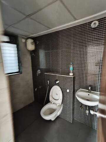 Bathroom in 1.5 BHK Apartment at Lodha Lakeshore Greens, Dombivli East – for Rent