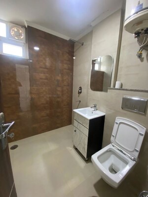 Bathroom in 4 BHK Apartment at Sector 5 Dwarka – for Rent