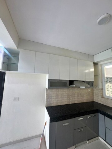 Kitchen in Studio Apartment at DLF Bella Greens, Begur – for Rent