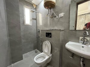 Bathroom in 2 BHK Apartment at Freedom Fighters Enclave – for Rent