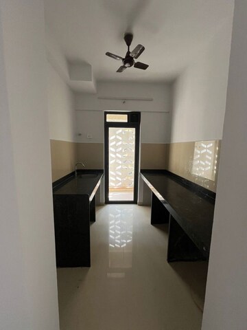 Kitchen in 2 BHK Apartment at Lodha Downtown, Dombivli East – for Rent