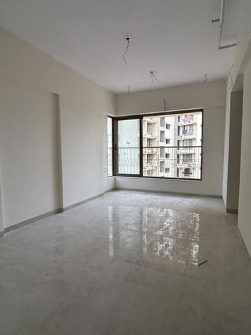 Room in 1 BHK Apartment at Abrol Residency, Malad West – for Sale