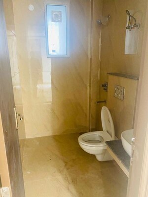 Bathroom in 2 BHK Apartment at Affinity Greens, International Airport Road – for Rent