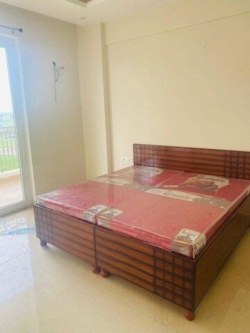 Bedroom in 2 BHK Apartment at Affinity Greens, International Airport Road – for Rent