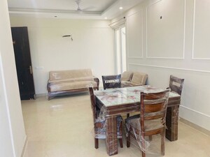 Living Room in 2 BHK Apartment at Affinity Greens, International Airport Road – for Rent