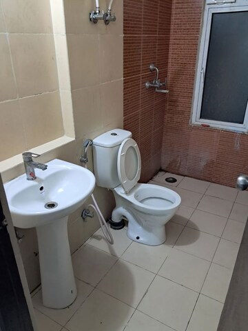 Bathroom in 2.5 BHK Apartment at Mahagun Mywoods, Sector 16c Greater Noida – for Rent