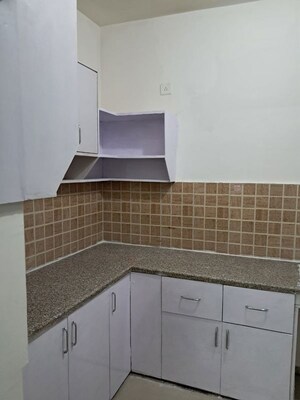 Kitchen in 2.5 BHK Apartment at Mahagun Mywoods, Sector 16c Greater Noida – for Rent