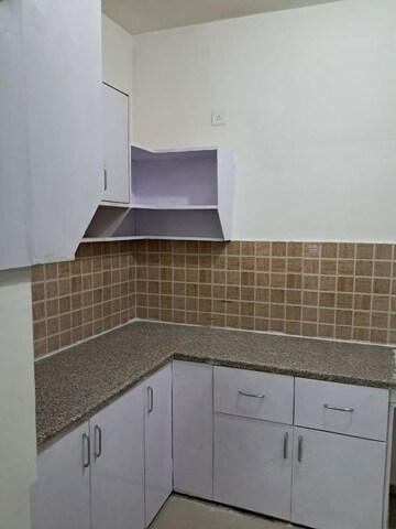 Kitchen in 2.5 BHK Apartment at Mahagun Mywoods, Sector 16c Greater Noida – for Rent