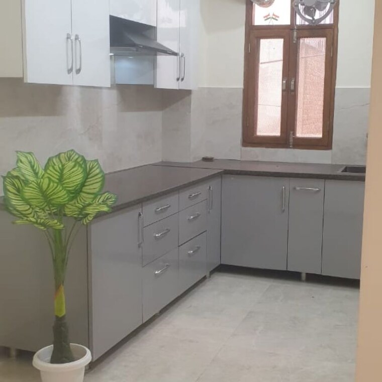 Kitchen, palam vihar extension 3.5 Bedroom 1400 Sq.Ft. Apartment In Palam Vihar Extension Gurgaon 9800085