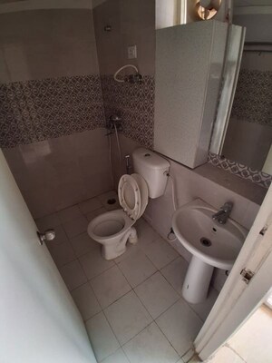 Bathroom in 3 BHK Apartment at Mahagun Mywoods, Sector 16c Greater Noida – for Rent