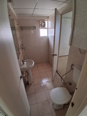 Bathroom in 3 BHK Apartment at Mahagun Mywoods, Sector 16c Greater Noida – for Rent