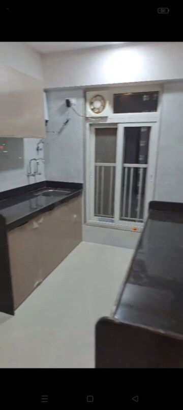 Kitchen in 2 BHK Apartment at Zee Ashtavinayak, Andheri West – for Rent