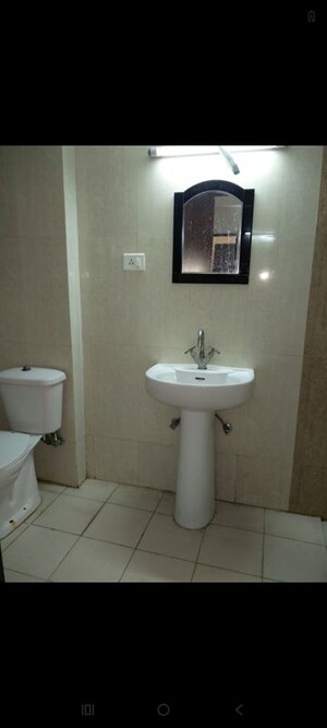 Bathroom in 3.5 BHK Apartment at Antriksh Golf View, Sector 78 – for Rent