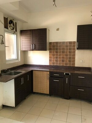 Kitchen in 2 BHK Apartment at Amrapali Zodiac, Sector 120 – for Sale