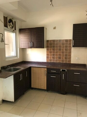 Kitchen in 2 BHK Apartment at Amrapali Zodiac, Sector 120 – for Sale