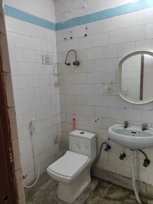 Bathroom in 3 BHK Apartment at Shipra Suncity, Vaibhav Khand – for Sale
