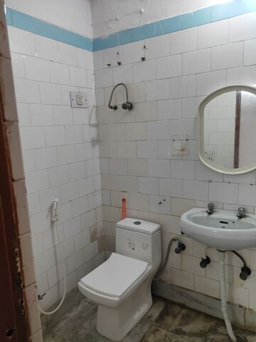 Bathroom in 3 BHK Apartment at Shipra Suncity, Vaibhav Khand – for Sale