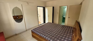 Bedroom in 3 BHK Apartment at Karia Konark Avenue 9, Kalyani Nagar – for Rent