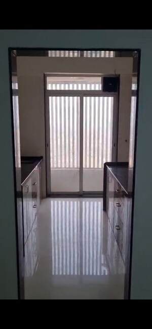 Kitchen in 2 BHK Apartment at Shreeji Atlantis, Malad West – for Rent