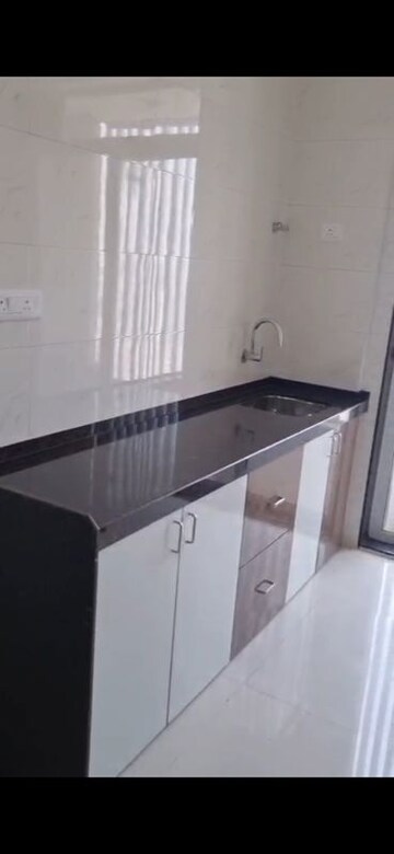 Kitchen in 2 BHK Apartment at Shreeji Atlantis, Malad West – for Rent