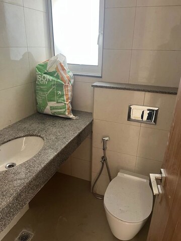 Bathroom in 2 BHK Apartment at Godrej Woods, Sector 43 – for Rent