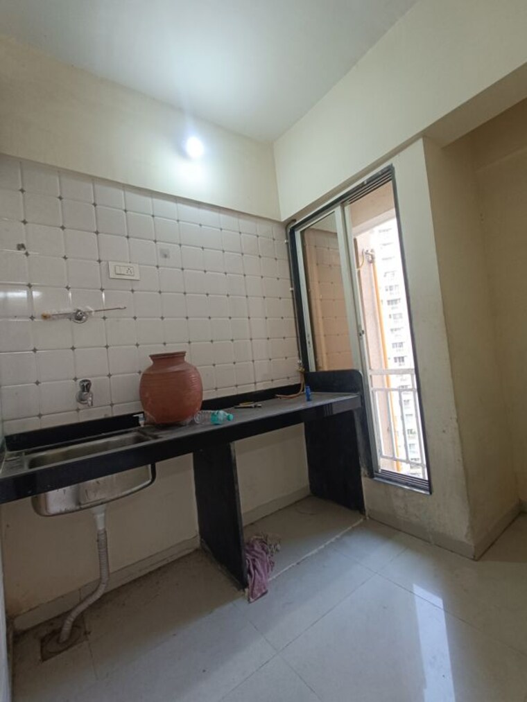 Kitchen, seven-apna-ghar-phase-2-plot-a 1 RK 260 Sq.Ft. Apartment In Mira Road Thane 9786862