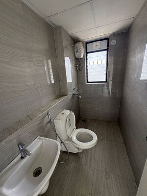 Bathroom in 3 BHK Apartment at Runwal Gardens Phase I, Dombivli East – for Rent